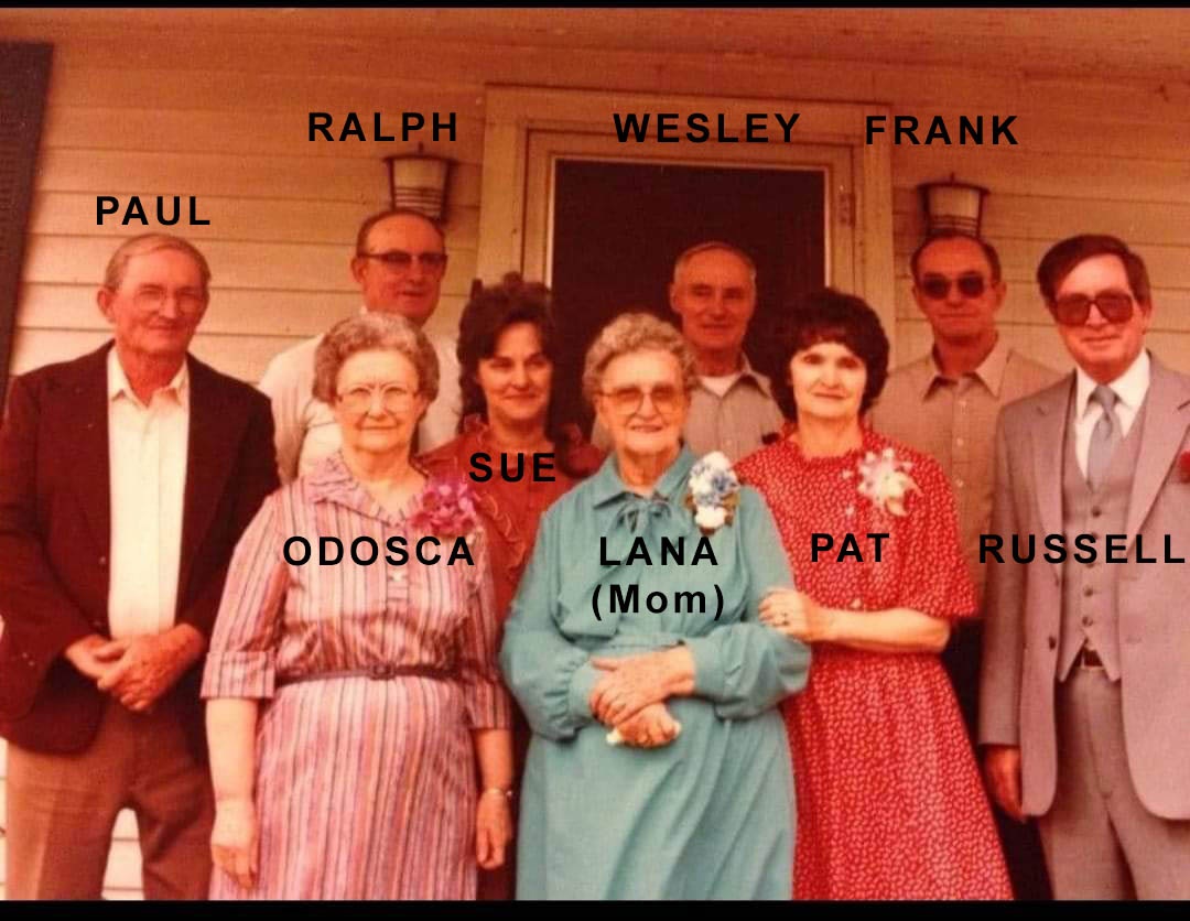 East family portrait with Russell, his mother, brothers and sisters